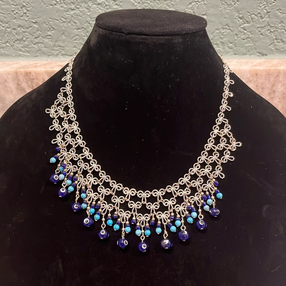 This beautiful sterling silver Greek evil eye pendant necklace by Bisou Bisou